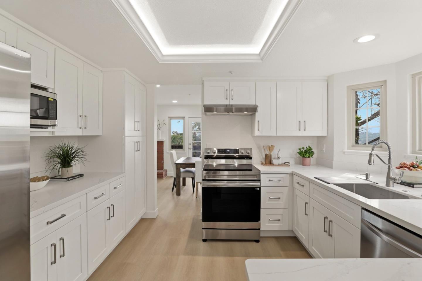 120 Haslemere Court Lafayette, CA 94549 - Photo 15 of 49 a kitchen with white cabinets and stainless steel appliances