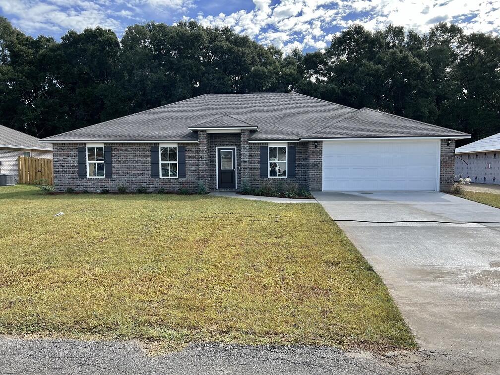 5288 Moore Loop Crestview, FL 32536 - Photo 1 of 1 a front view of a house with yard