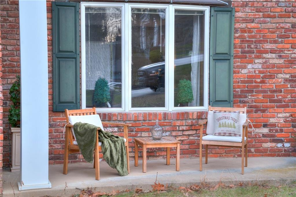 257 Arbor Hill Road Greensburg, PA 15601 - Photo 2 of 26 a view of a patio with table and chairs