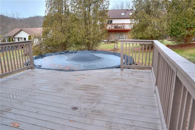 a view of a brick house with a balcony