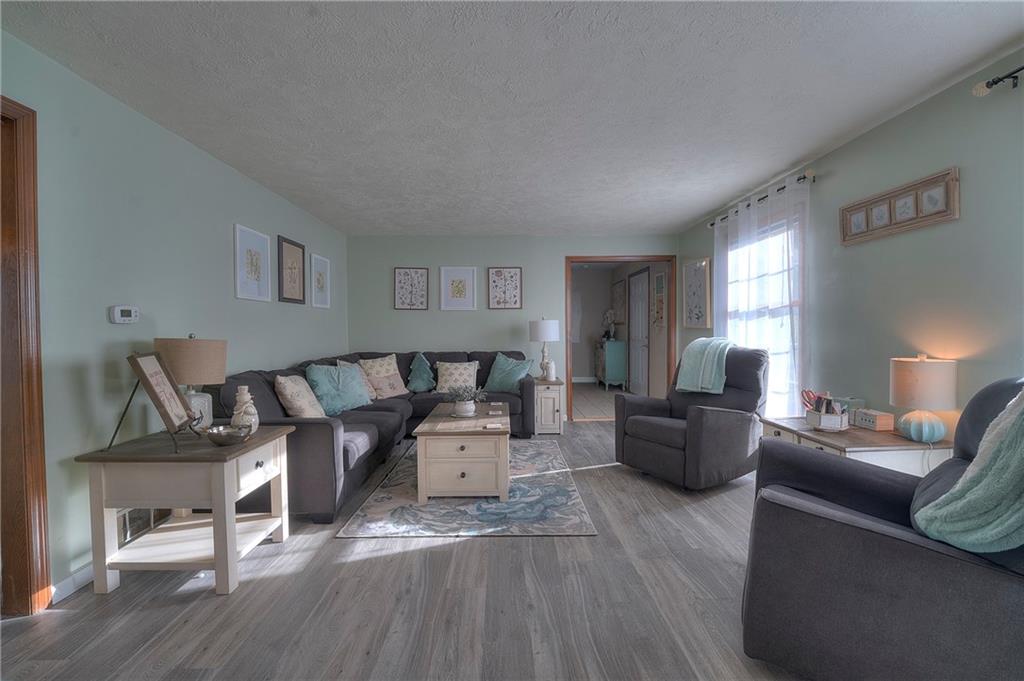257 Arbor Hill Road Greensburg, PA 15601 - Photo 4 of 26 a living room with furniture and a wooden floor