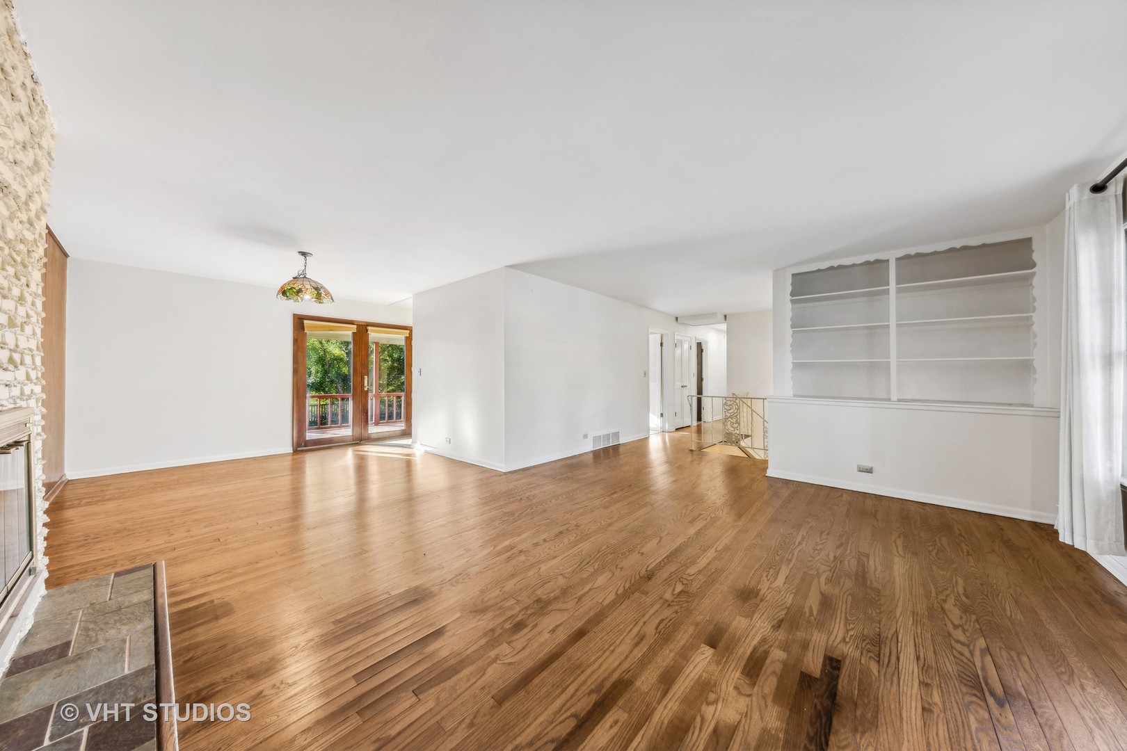 450 West Gartner Road Naperville, IL 60540 - Photo 14 of 31 a view of empty room with wooden floor and fan
