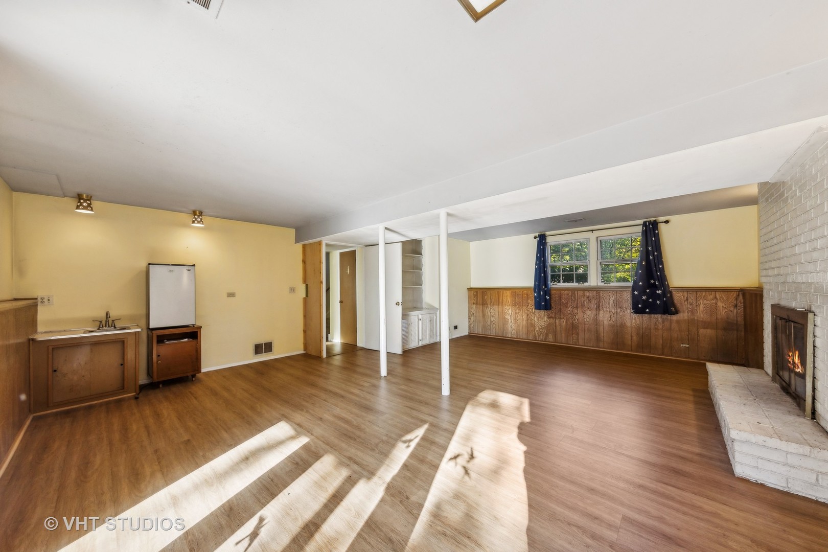 450 West Gartner Road Naperville, IL 60540 - Photo 16 of 31 a view of a living room hardwood floor and a kitchen