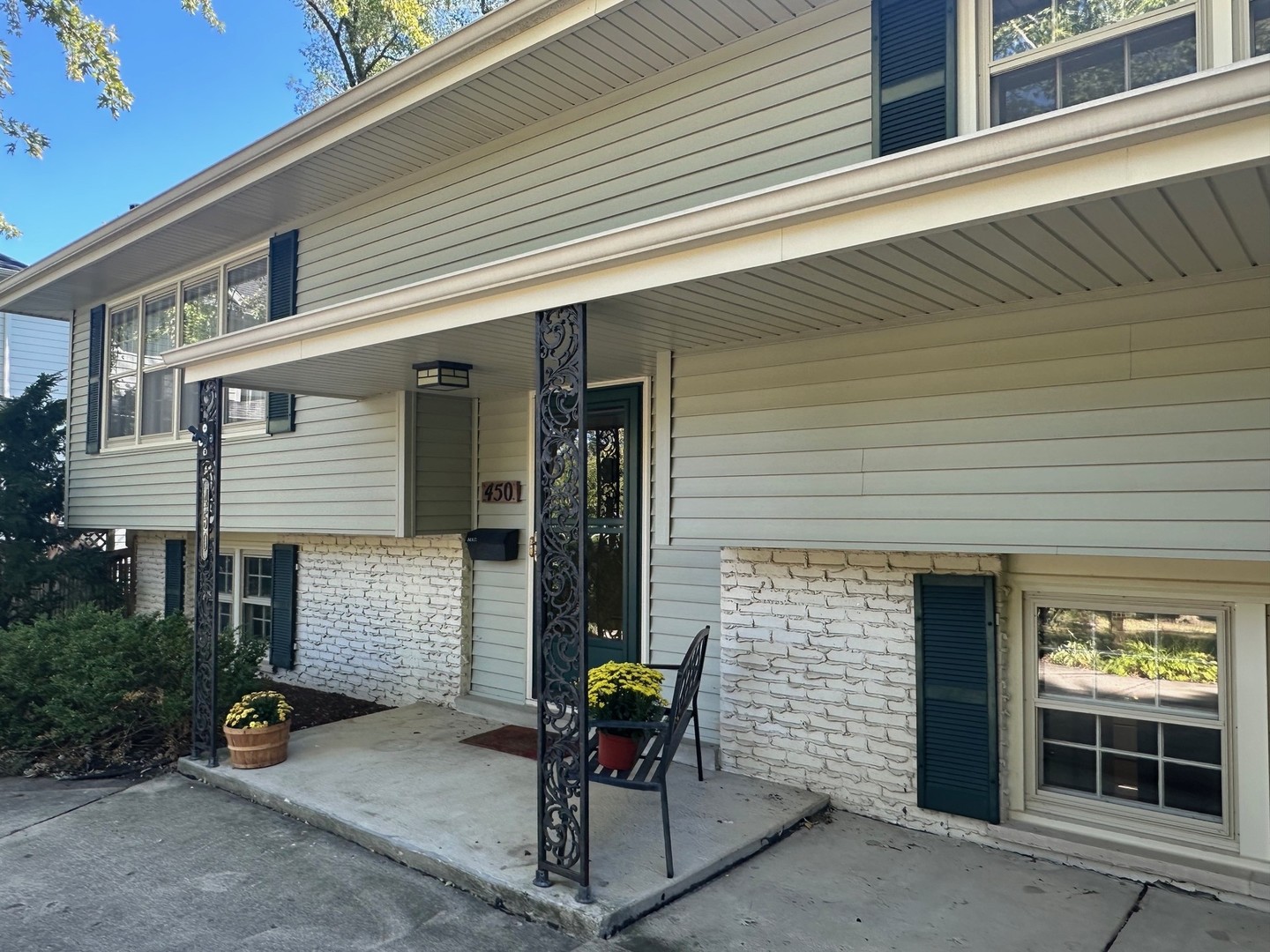 450 West Gartner Road Naperville, IL 60540 - Photo 2 of 31 a front view of a house with patio