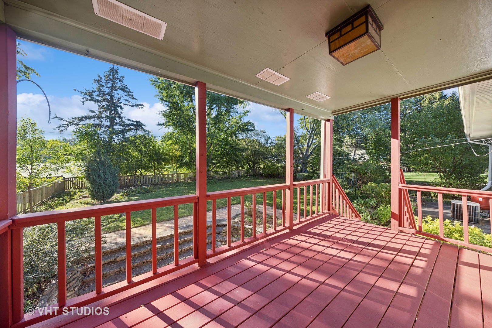 450 West Gartner Road Naperville, IL 60540 - Photo 24 of 31 a view of a porch with wooden floor and outdoor seating