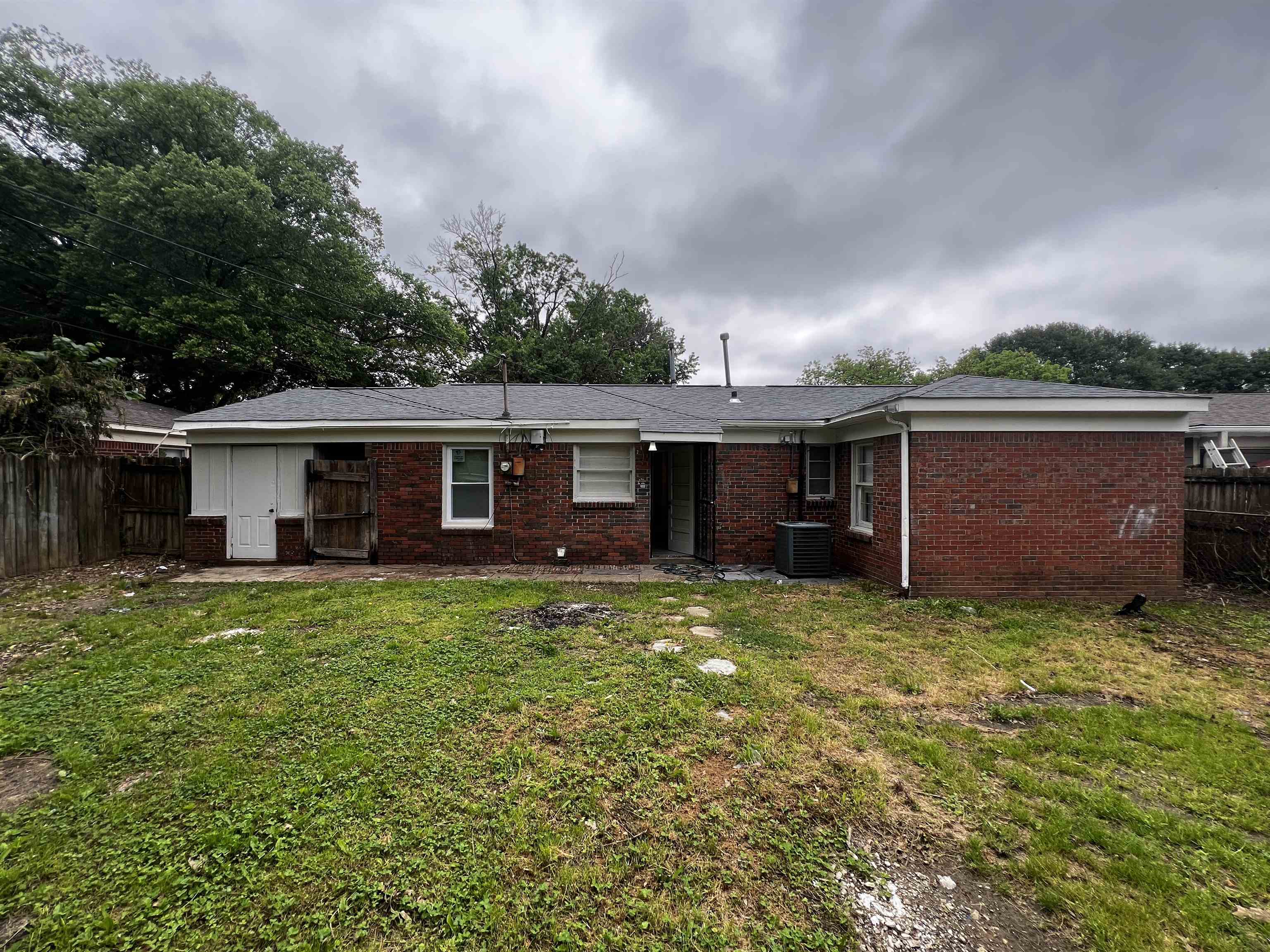 4801 Given Avenue Memphis, TN 38122 - Photo 13 of 13 a view of a house with a yard