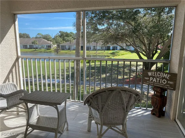 a view of a chairs and table in patio