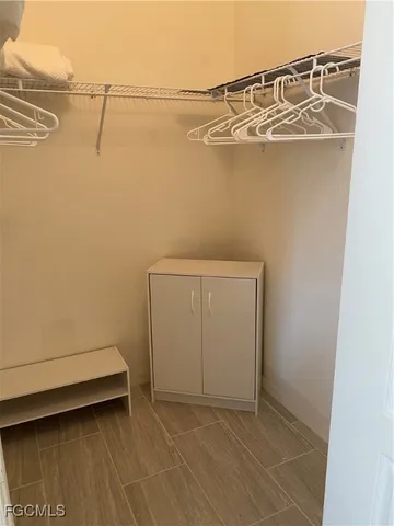 a view of a room with racks on the wall