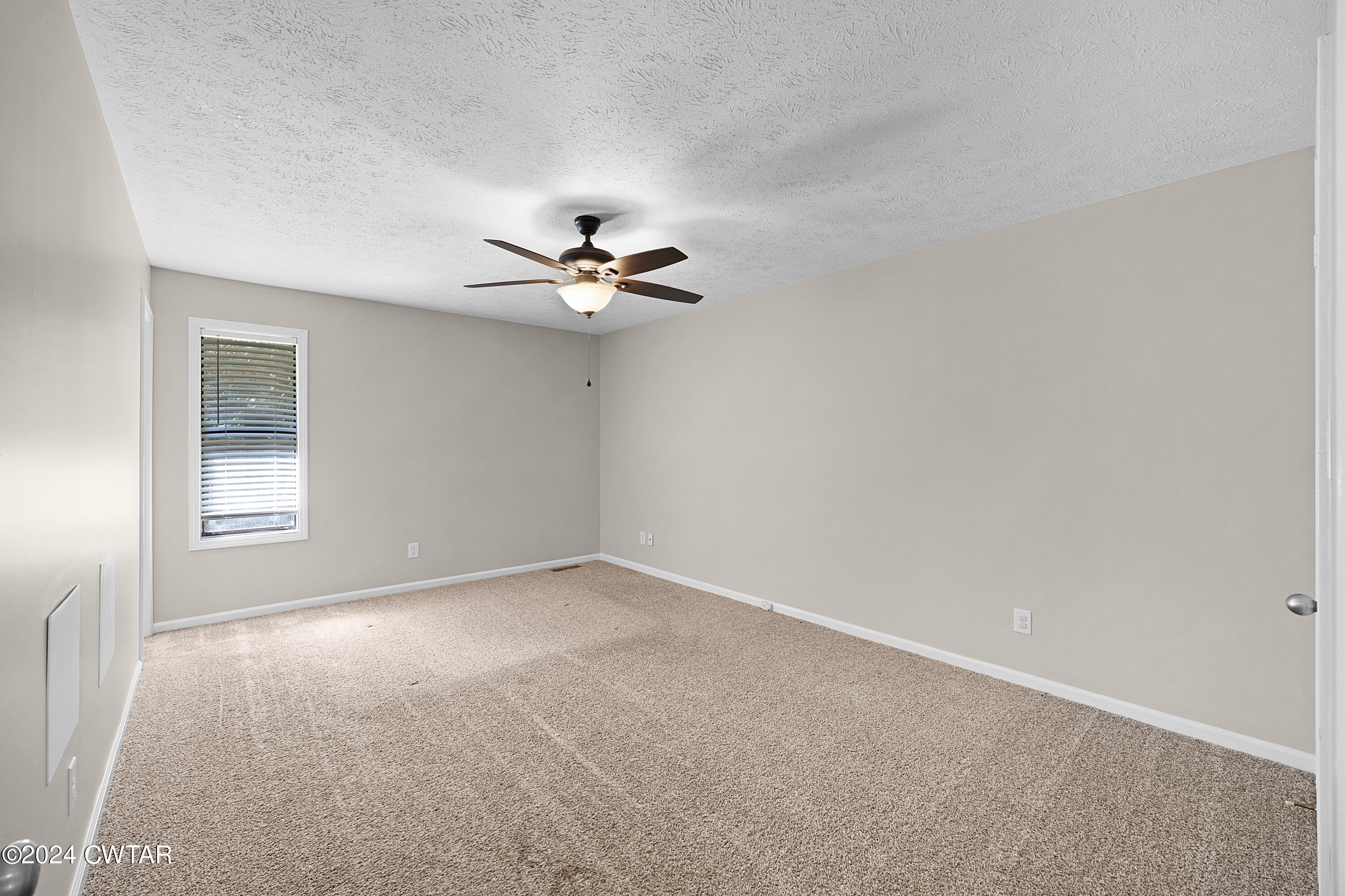 117 Ridgeoak Place Jackson, TN 38305 - Photo 19 of 20 a view of an empty room with a window