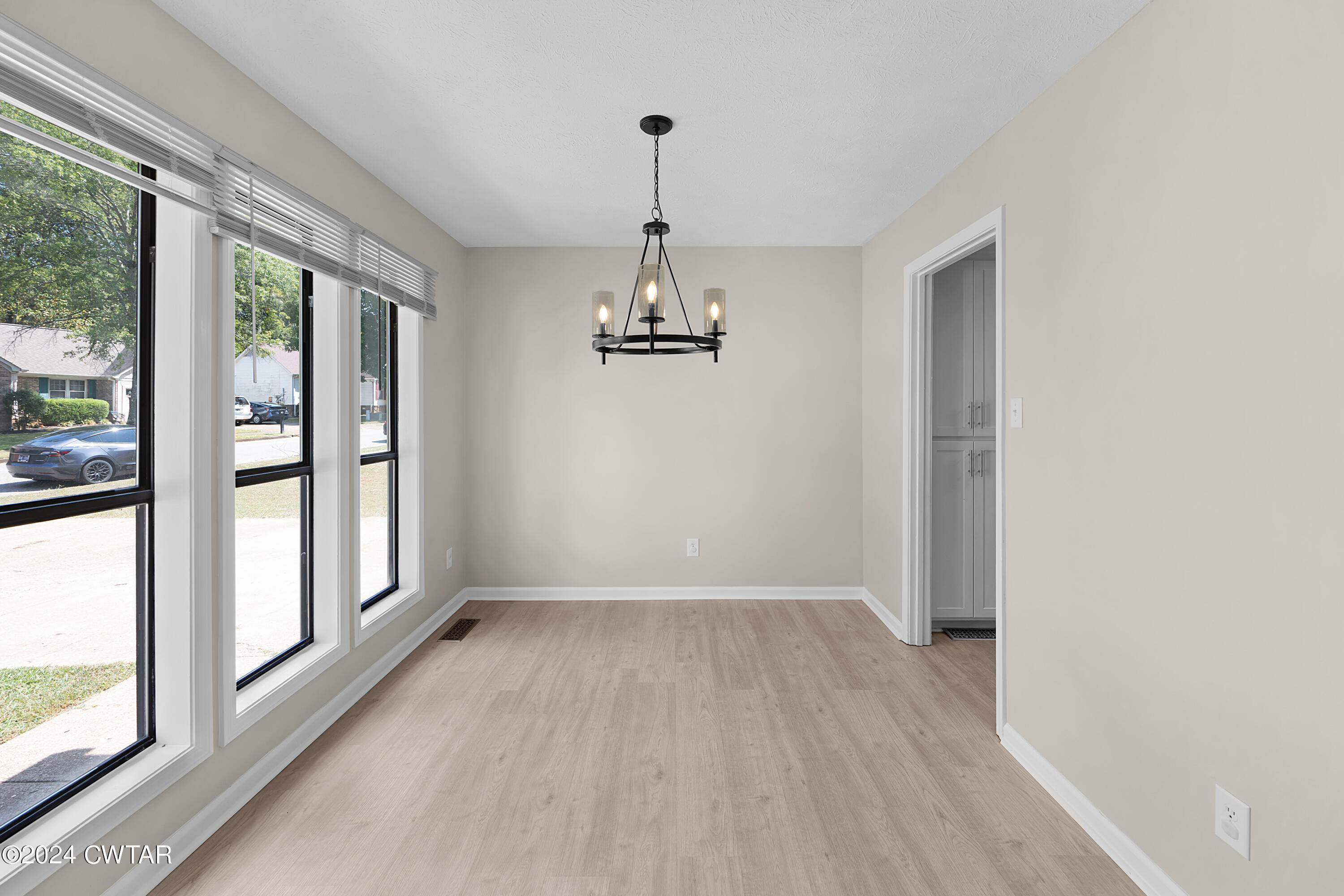 117 Ridgeoak Place Jackson, TN 38305 - Photo 2 of 20 a view of a room with wooden floor windows