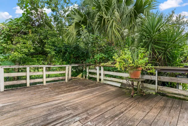 a view of a chairs and table on the wooden floor