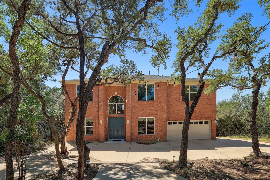 8204 Texas Plume Road Austin, TX 78759 - Photo 1 of 1 a view of a white house with a large tree