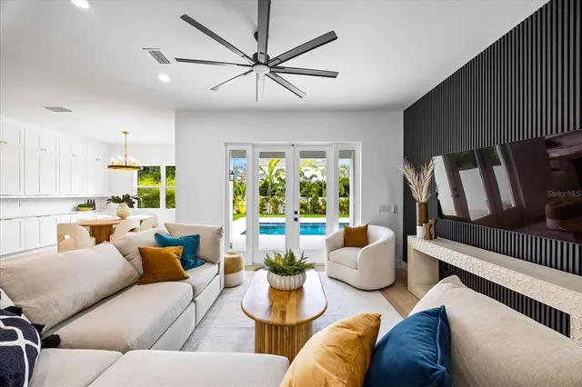 a kitchen with stainless steel appliances granite countertop a stove and a microwave