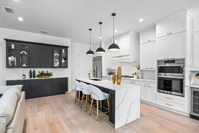 a bedroom with double bed and a window