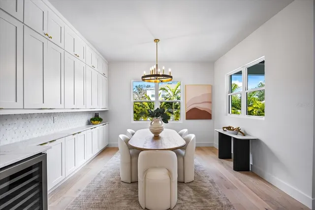 a view of a swimming pool with a lounge chairs