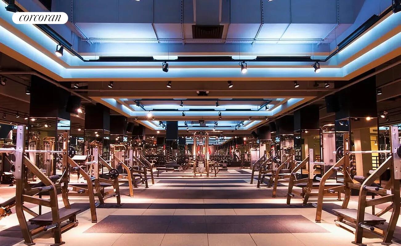 350 West 50th Street, Unit 4BB Manhattan, NY 10019 - Photo 13 of 14 a view of a room with gym equipment