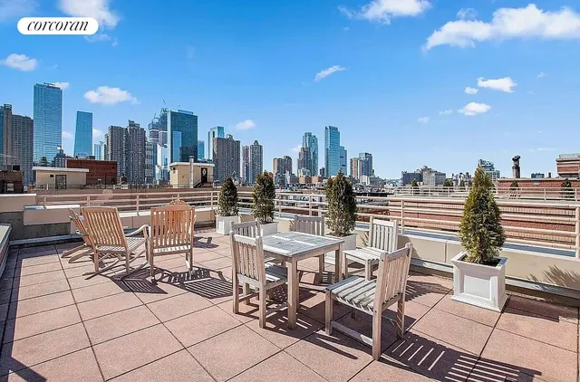 a view of a terrace with sitting area