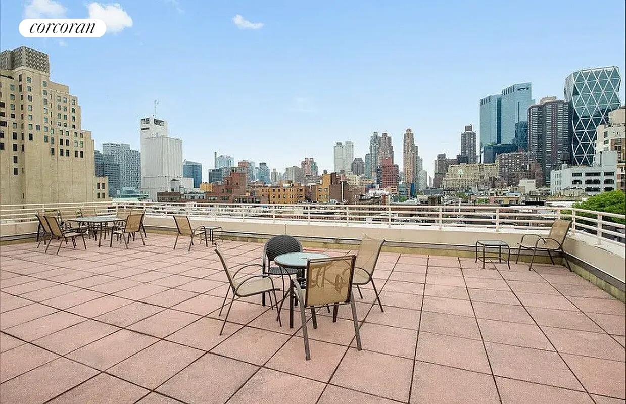 350 West 50th Street, Unit 4BB Manhattan, NY 10019 - Photo 7 of 14 a view of a city with tall buildings