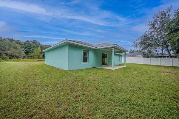 a house view with a garden space
