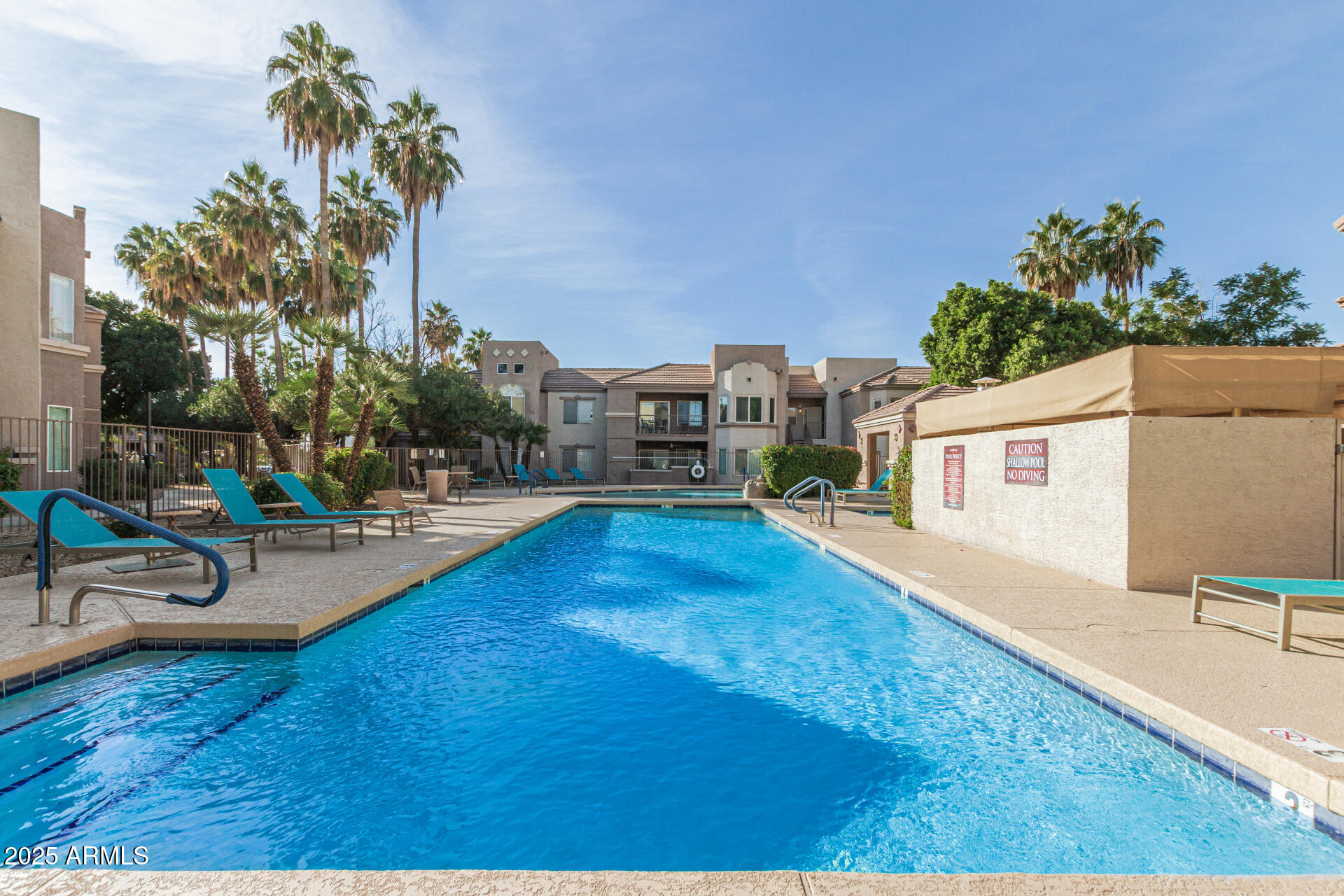 17017 North 12th Street, Unit 1035 Phoenix, AZ 85022 - Photo 16 of 19 a view of a house with swimming pool
