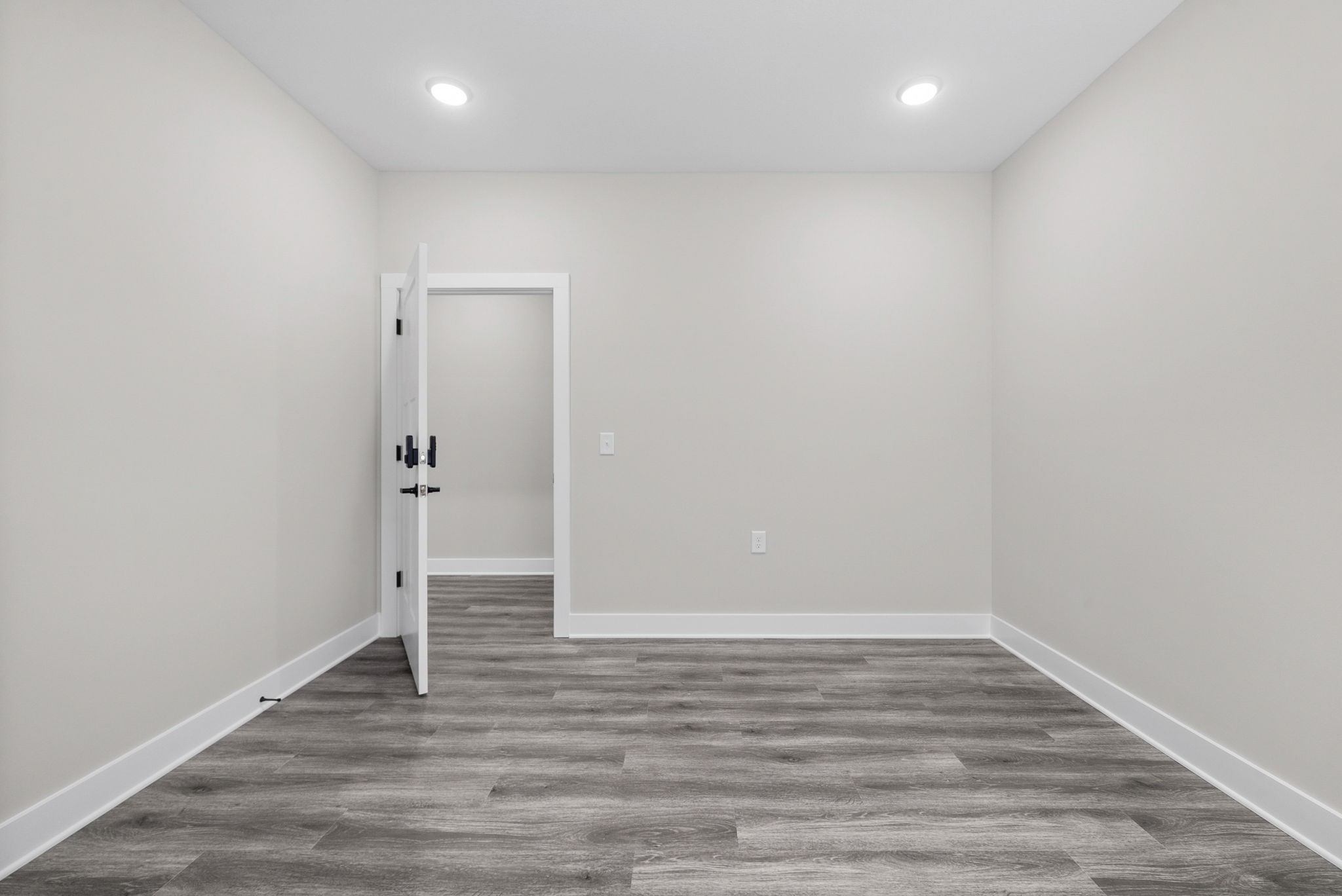 2510 Pea Ridge Road Clarksville, TN 37040 - Photo 17 of 41 an empty room with wooden floor
