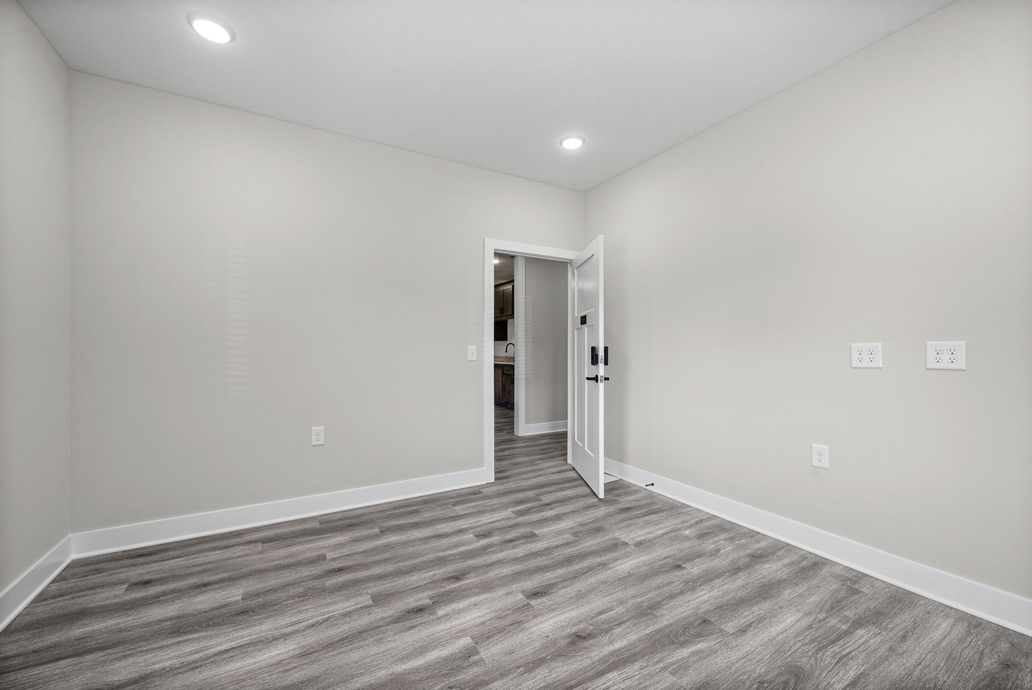 2510 Pea Ridge Road Clarksville, TN 37040 - Photo 21 of 41 a view of an empty room with wooden floor