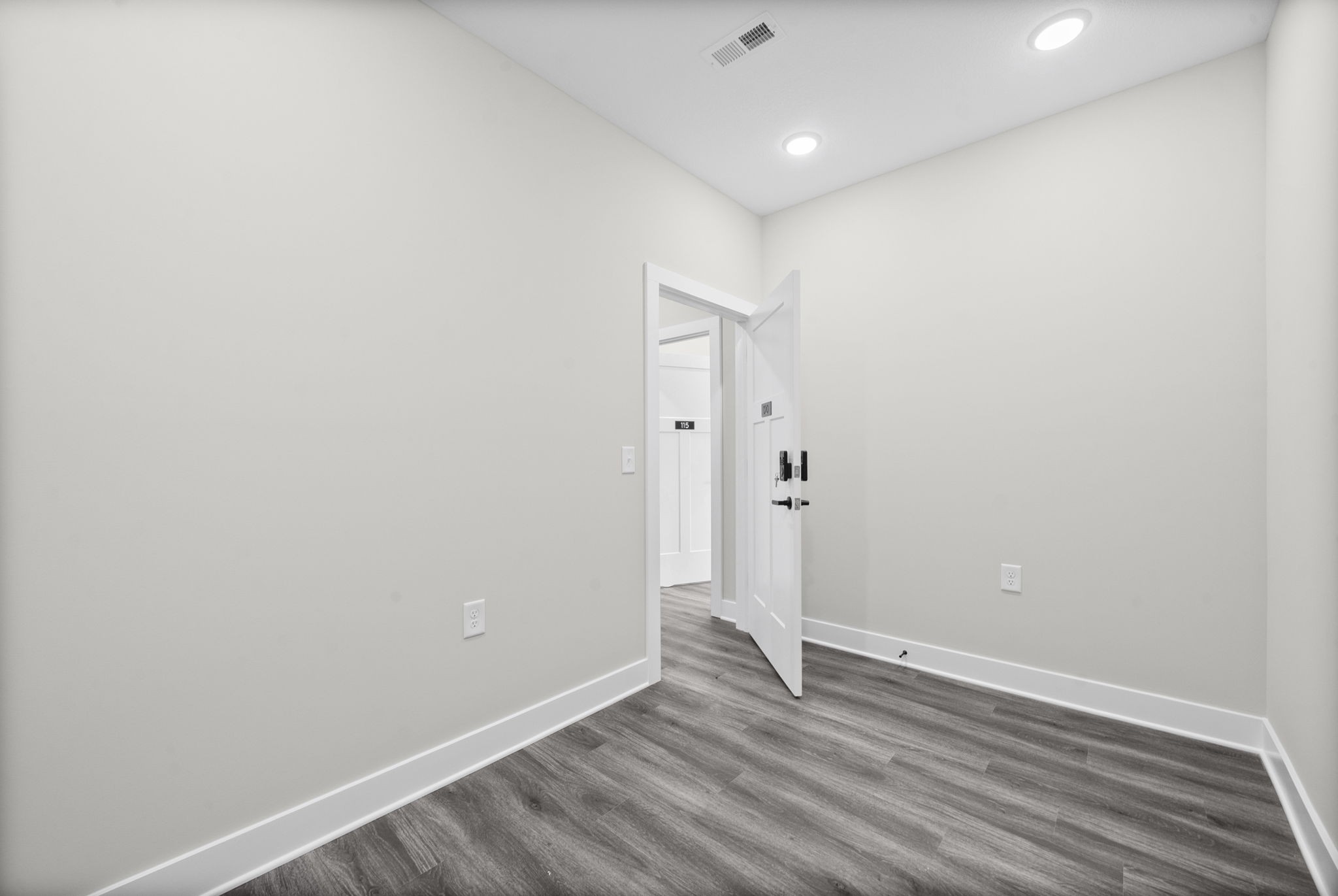 2510 Pea Ridge Road Clarksville, TN 37040 - Photo 23 of 41 a view of an empty room with wooden floor