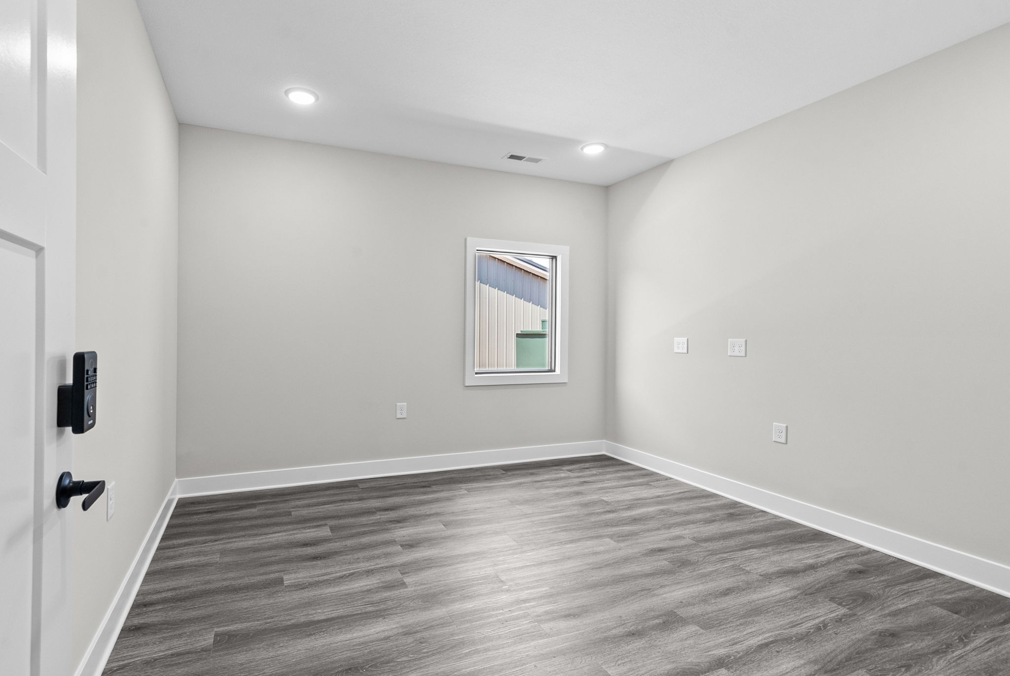 2510 Pea Ridge Road Clarksville, TN 37040 - Photo 33 of 41 wooden floor in an empty room with a window