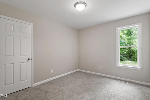 an empty room with a window