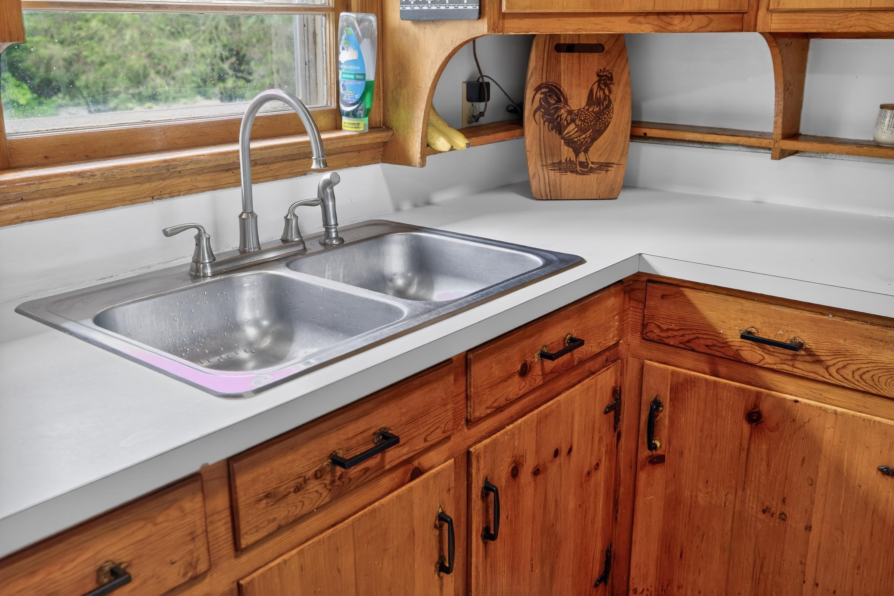 7827 Lee Highway Raphine, VA 24472 - Photo 19 of 62 a kitchen with a sink and a wooden floor