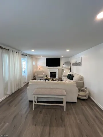 a bed room with two bed and a tv