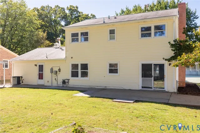 a view of a house with swimming pool and porch