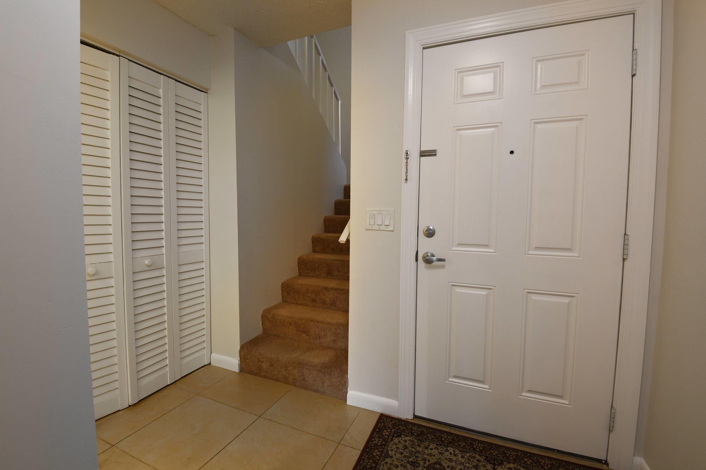 21748 Juego Circle, Unit 21E Boca Raton, FL 33433 - Photo 41 of 56 a view of a room with stairs