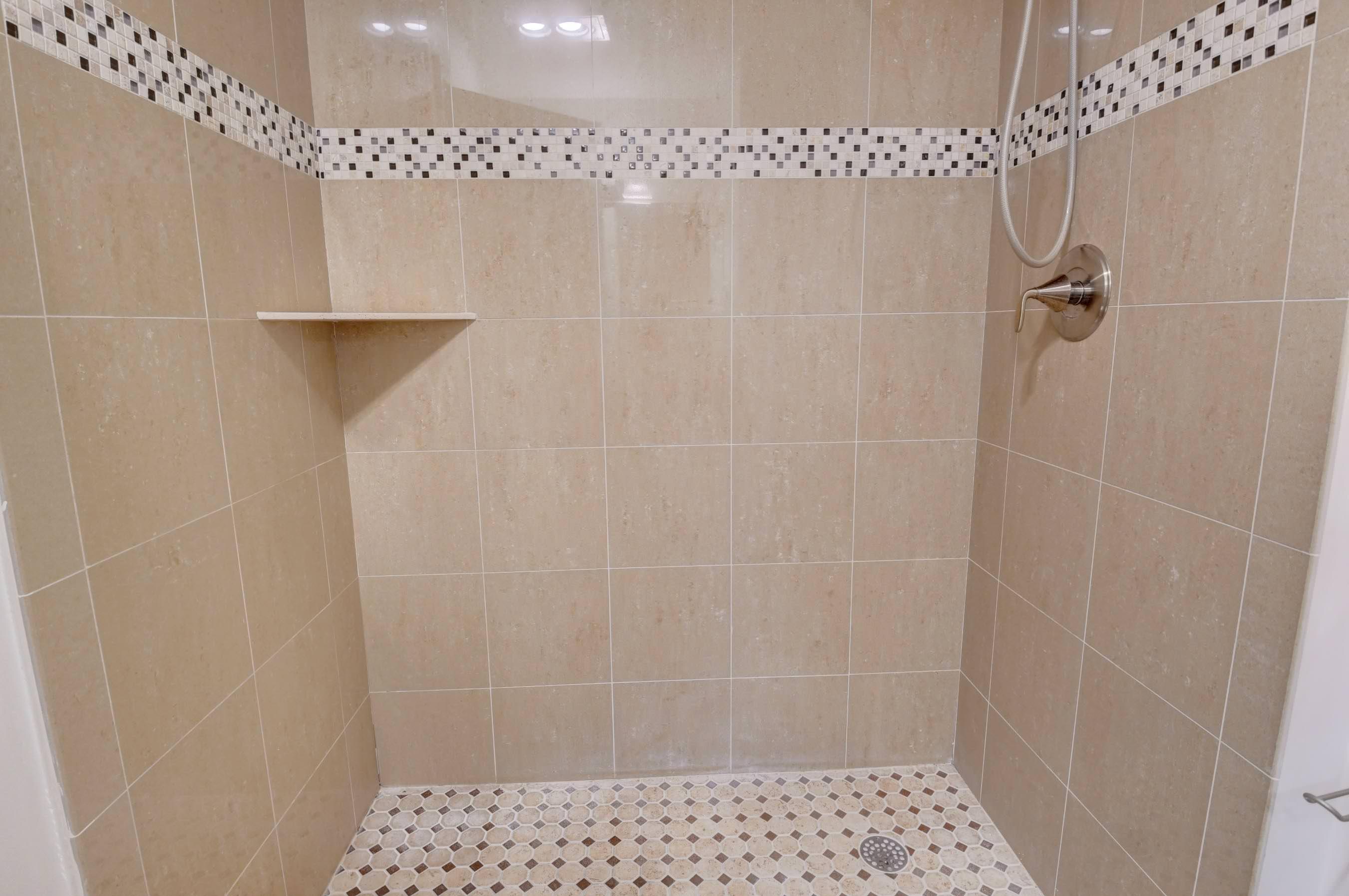 21748 Juego Circle, Unit 21E Boca Raton, FL 33433 - Photo 55 of 56 a bathroom with a shower