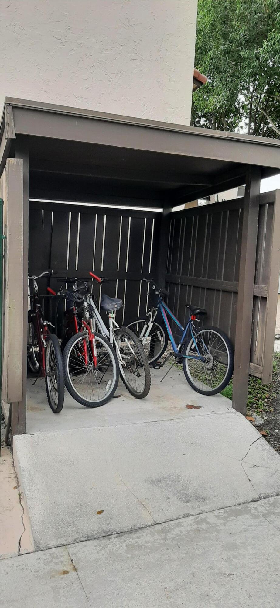 21748 Juego Circle, Unit 21E Boca Raton, FL 33433 - Photo 56 of 56 Covered bicycle storage on side