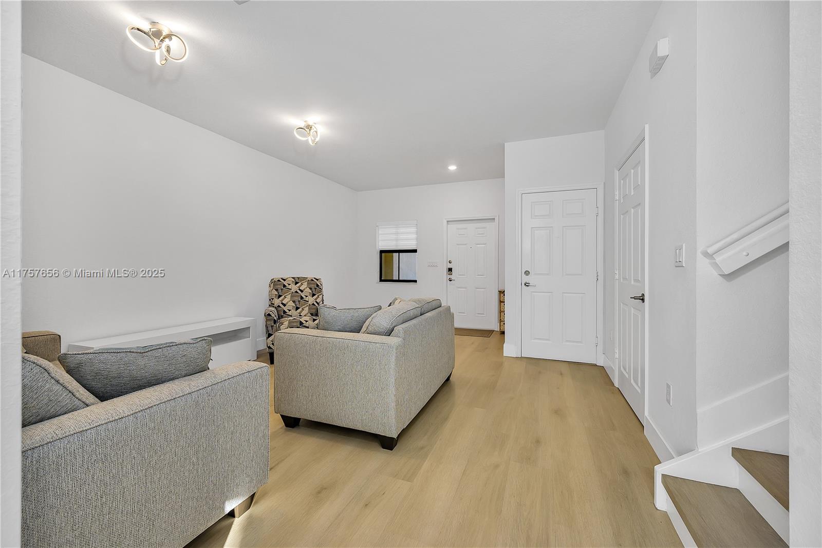 4671 Santa Cruz Way, Unit 4671 Davie, FL 33314 - Photo 8 of 20 a living room with furniture and a couch