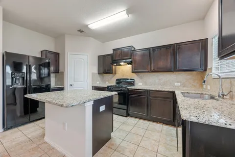 $320,000 | 3701 Black Granite Drive, Austin, TX 78744