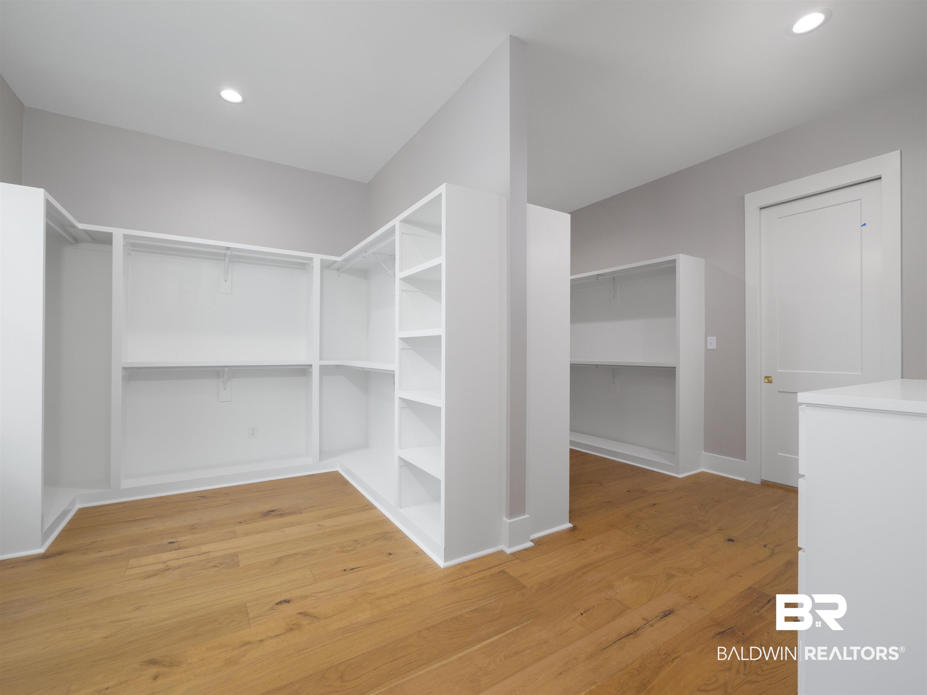 10912 Catania Avenue Fairhope, AL 36532 - Photo 23 of 54 Main closet with two sides and built in cabinets