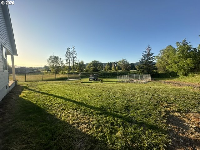 946 South Calapooia Street Sutherlin, OR 97479 - Photo 26 of 31 a view of a golf course with a lake