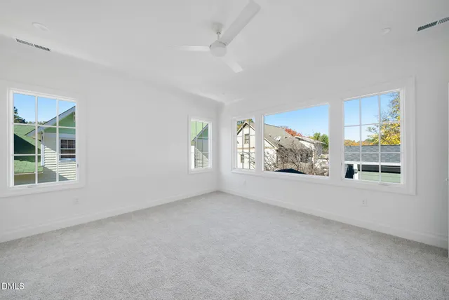 a white bath tub sitting next to a white sink