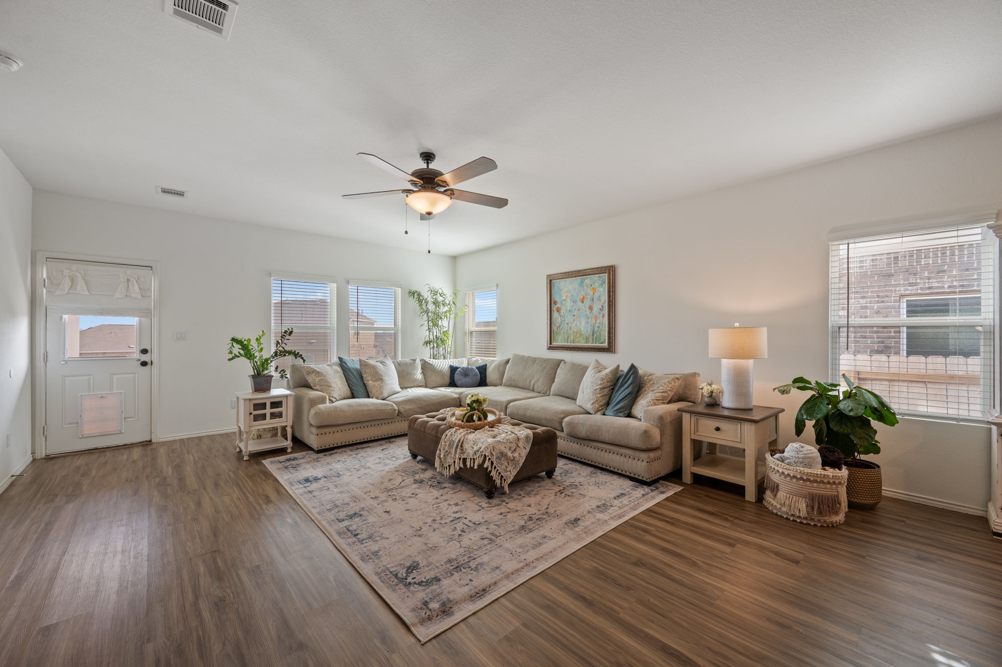 705 Mallow Road Leander, TX 78641 - Photo 12 of 29 a living room with furniture and wooden floor