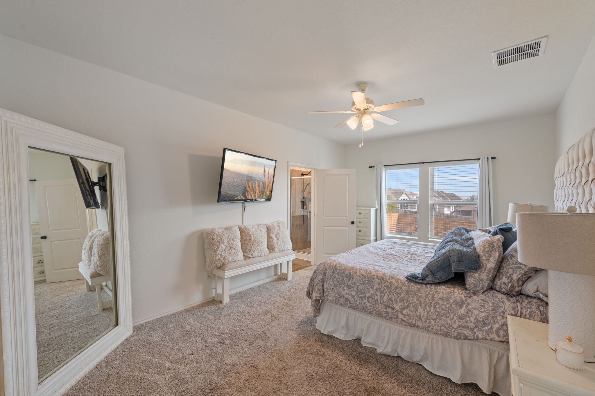 705 Mallow Road Leander, TX 78641 - Photo 13 of 29 a living room with furniture a ceiling fan and a rug
