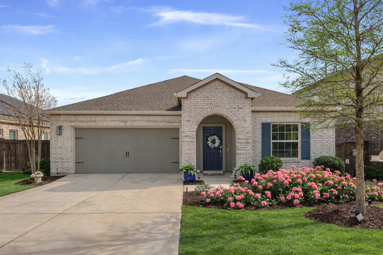 705 Mallow Road Leander, TX 78641 - Photo 2 of 29 a front view of house with a garden