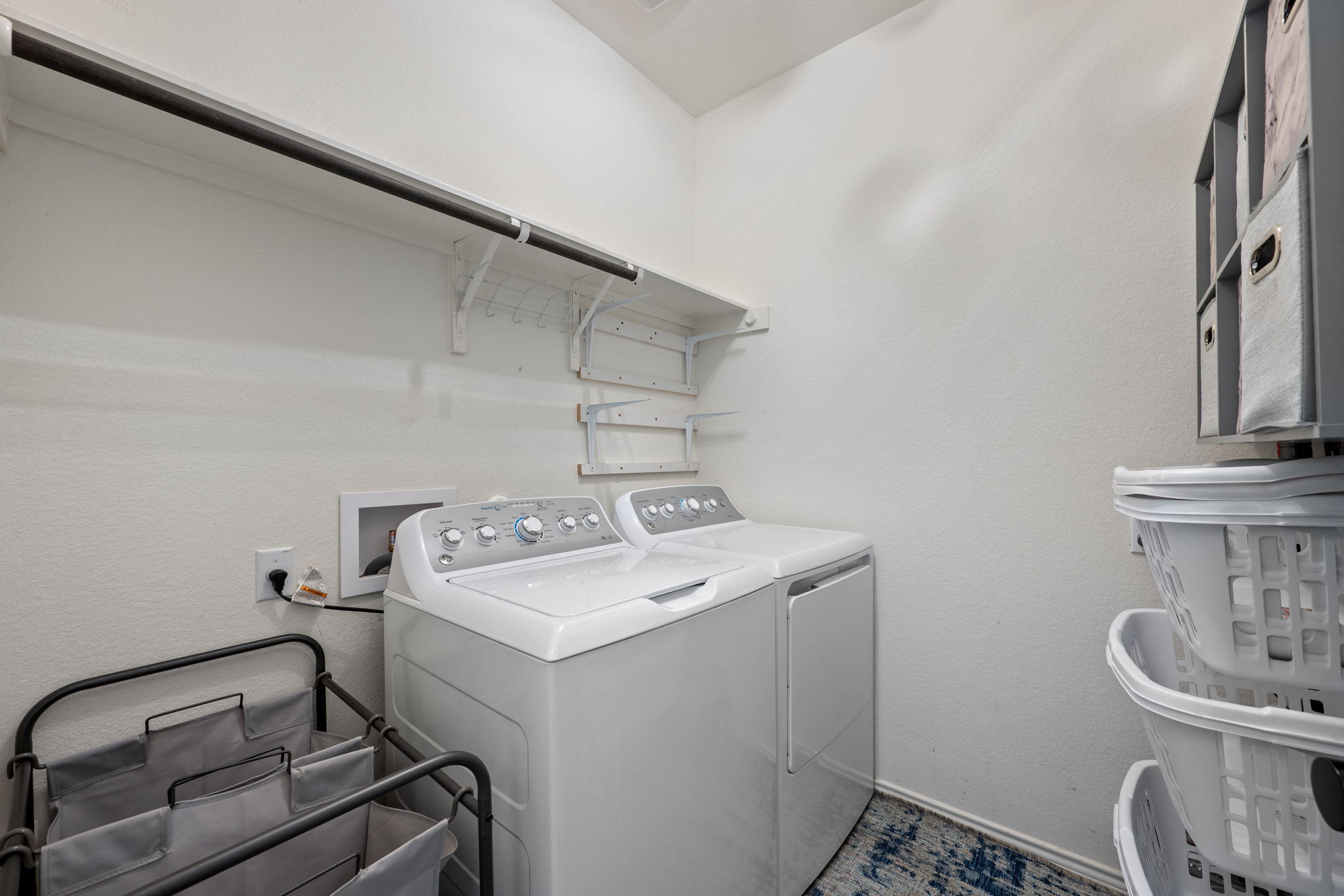 705 Mallow Road Leander, TX 78641 - Photo 23 of 29 a utility room with dryer and washer