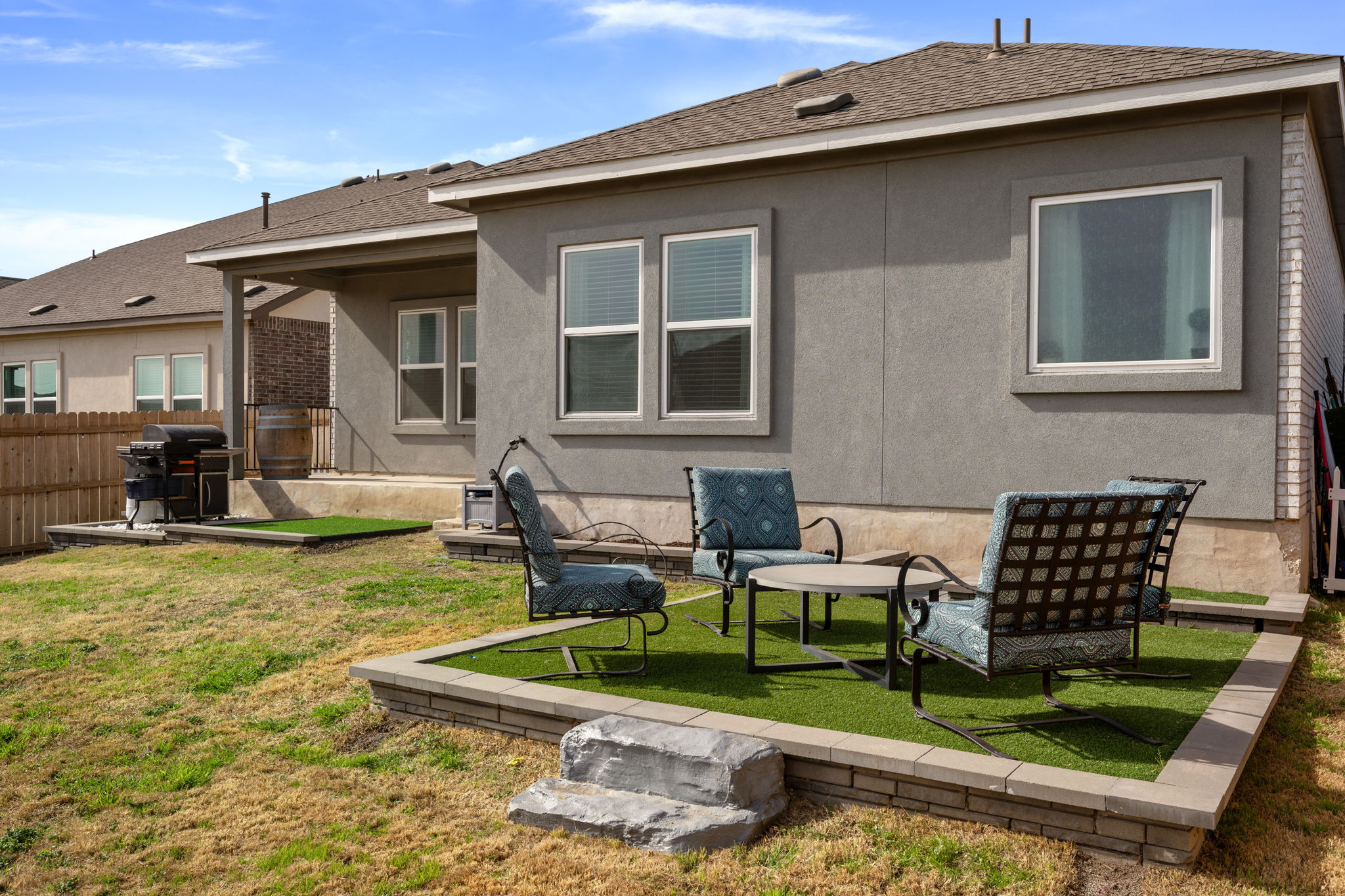 705 Mallow Road Leander, TX 78641 - Photo 25 of 29 a front view of a house with garden