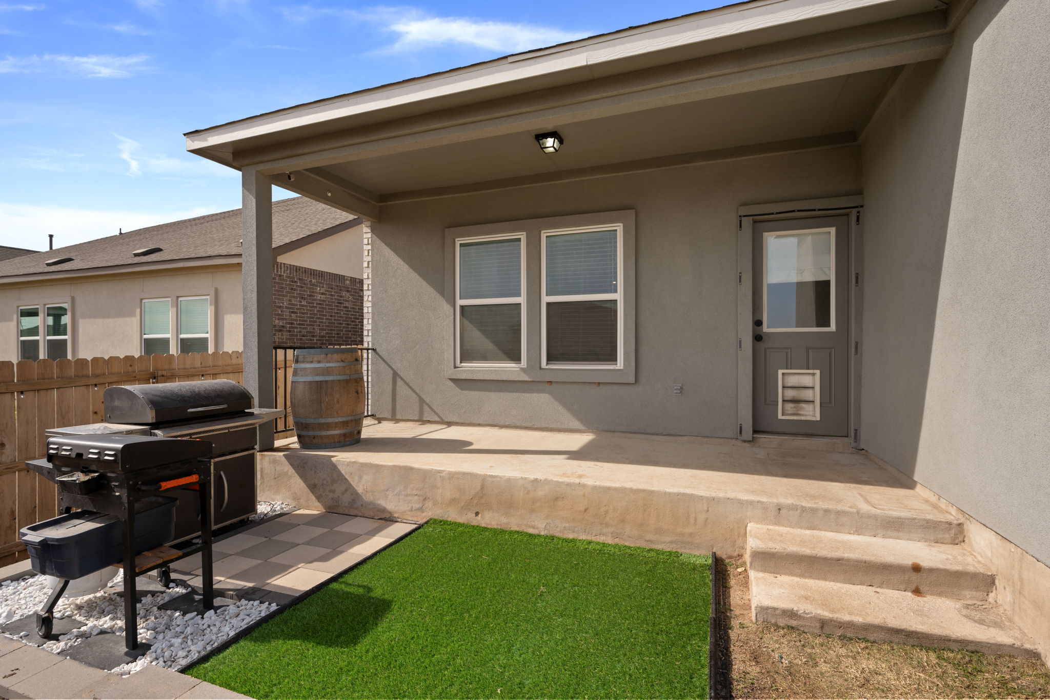 705 Mallow Road Leander, TX 78641 - Photo 26 of 29 a backyard view of a house with outdoor seating