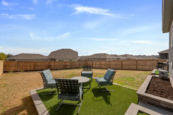 a view of a terrace with sitting area