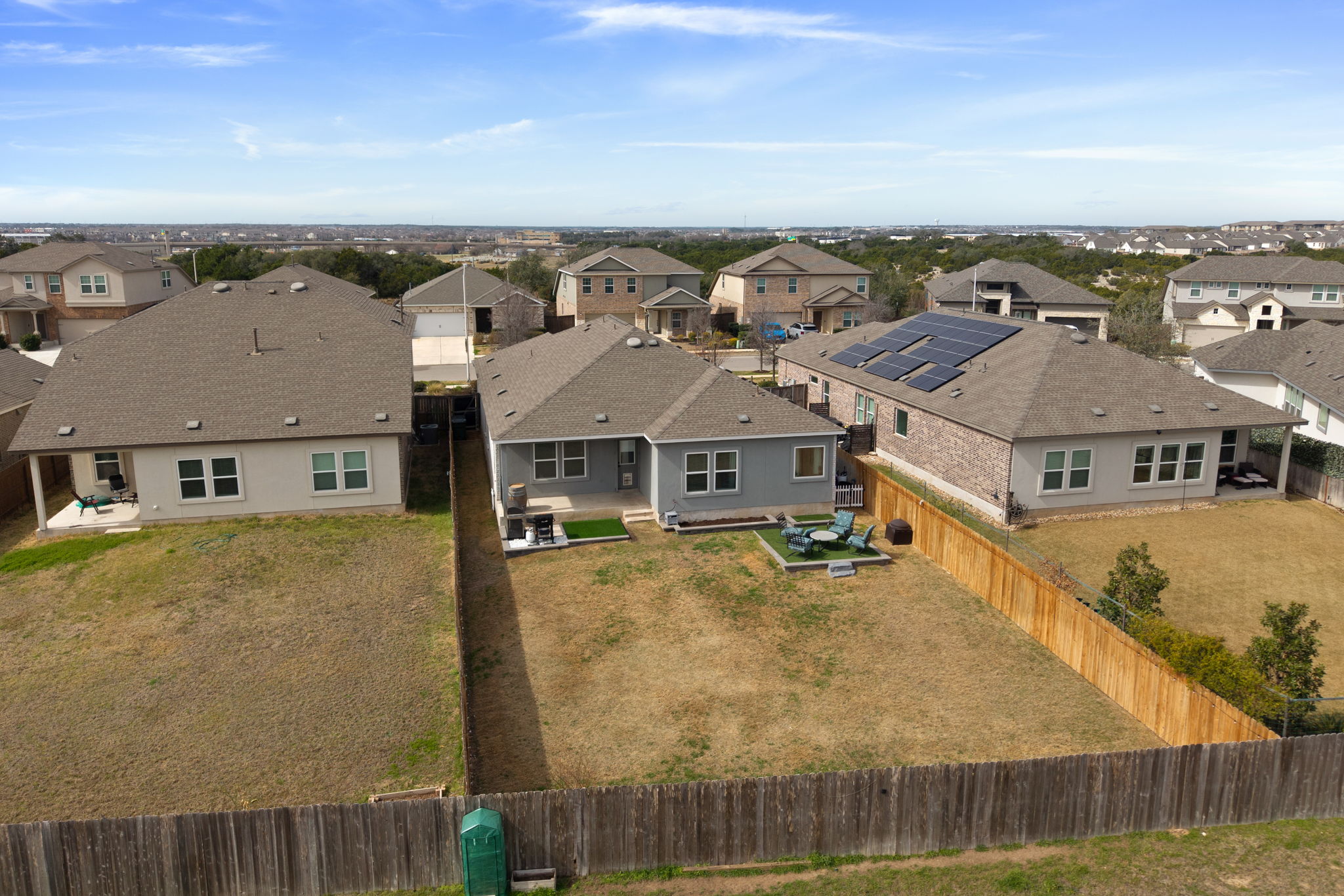 705 Mallow Road Leander, TX 78641 - Photo 28 of 29 an aerial view of residential houses with outdoor space and swimming pool