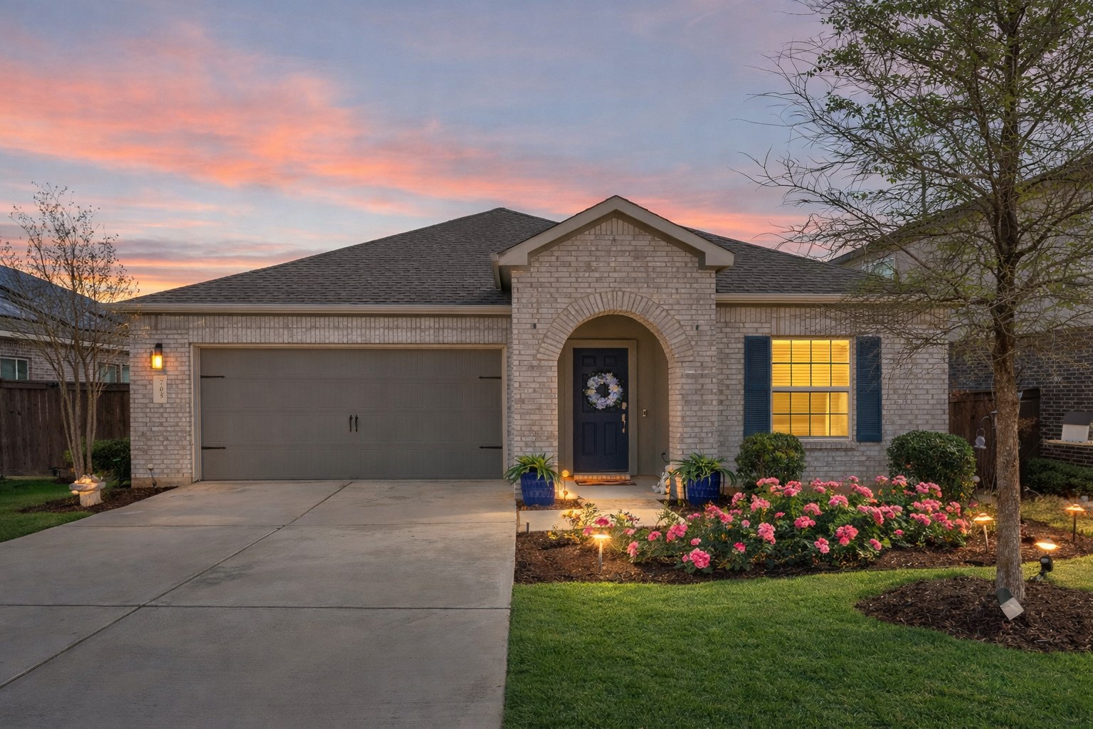 705 Mallow Road Leander, TX 78641 - Photo 3 of 29 a front view of house with a garden