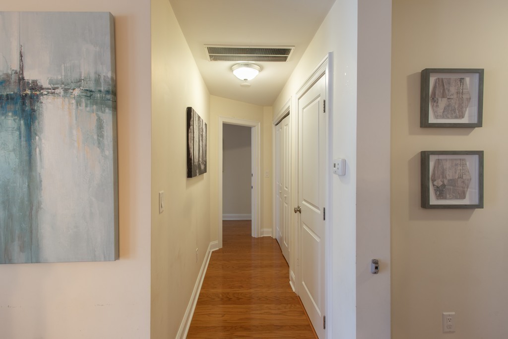11 Cheriton Road, Unit 307 Boston, MA 02132 - Photo 7 of 12 a view of a hallway with walk in closet